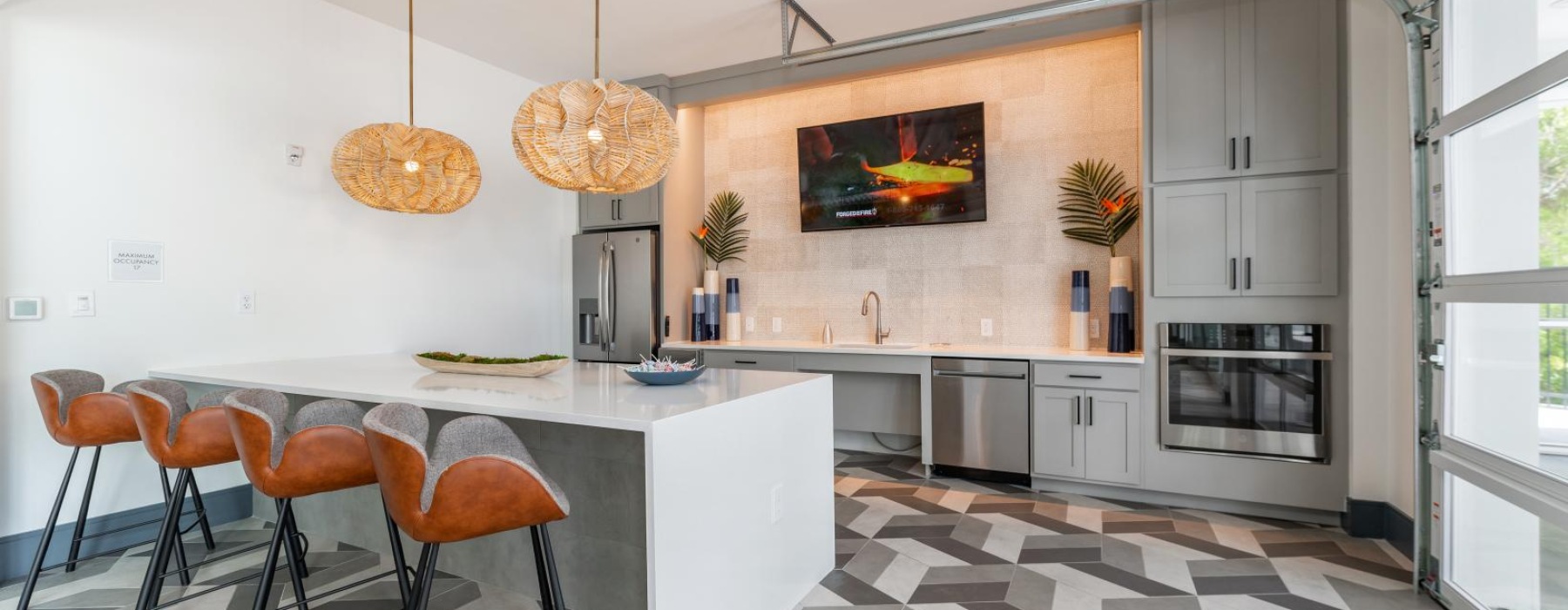 a kitchen with a table and chairs