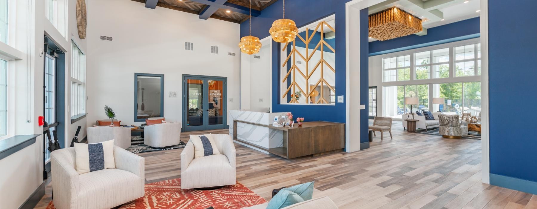 a living room with a large blue and white ceiling