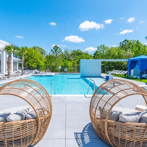 a couple of baskets by a pool